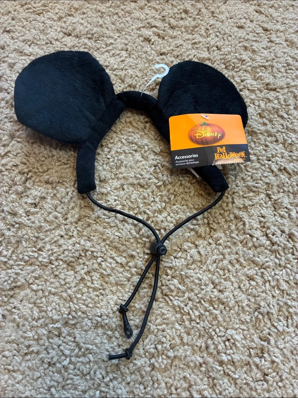 Disney Black Plush Mouse Ear Headband with Orange Tag for dogs.